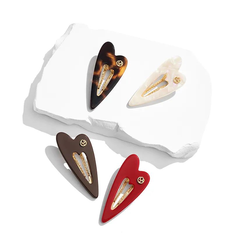 Delilah Heartbeat Pelican Clip - EVITA PERONI OFFICIAL