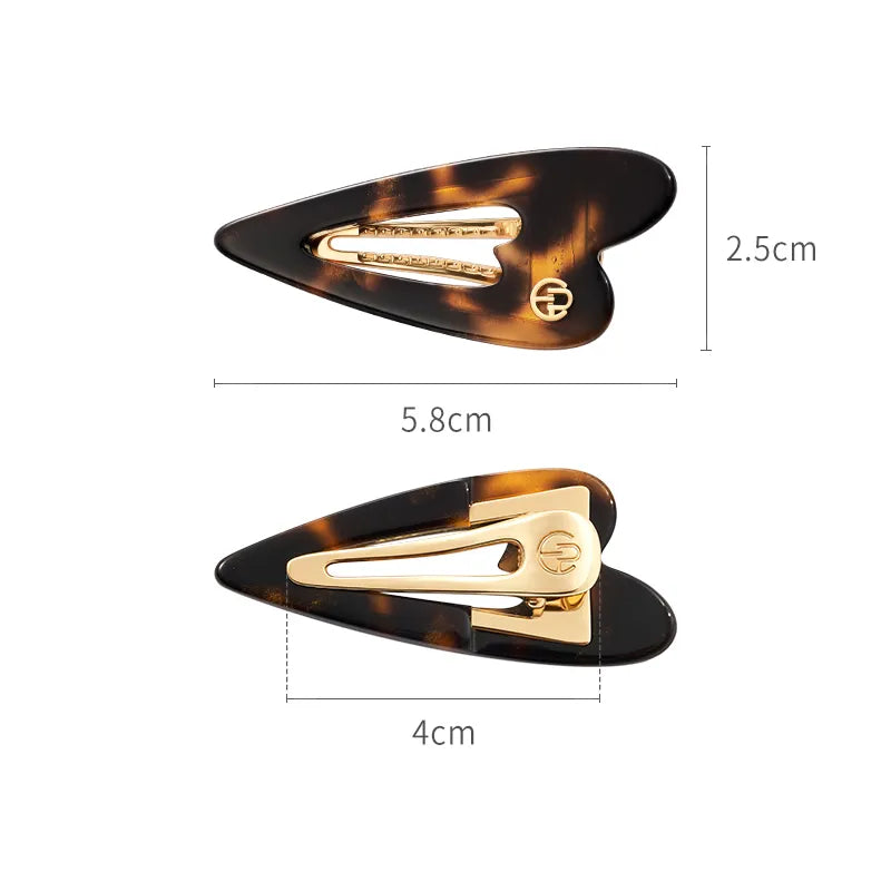 Delilah Heartbeat Pelican Clip - EVITA PERONI OFFICIAL